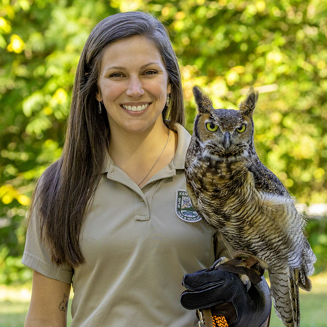 Cassidy holding a predatory bird